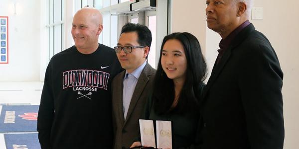 From left to right: Dunwoody High School Principal, Tom Bass; Annie’s father, Mr. Peng; Annie Peng; and Congressman Johnson  