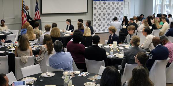 Picture of Rep. Hank Johnson giving speech to reception crowd
