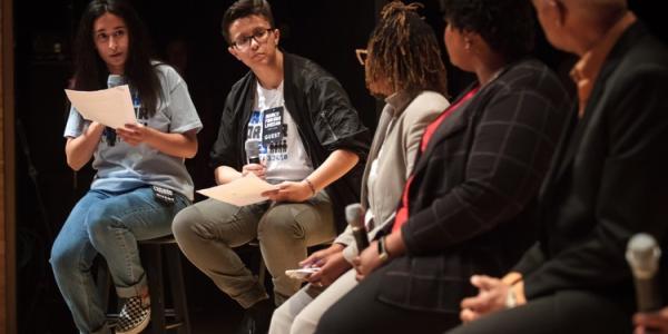 High school students Anam Hussain (left) and Joey Lopez direct questions to a panel of speakers during the Town Hall For Our Lives at the Rialto Center for the Arts in Atlanta on Saturday, April 7, 2018. STEVE SCHAEFER / SPECIAL TO THE AJC